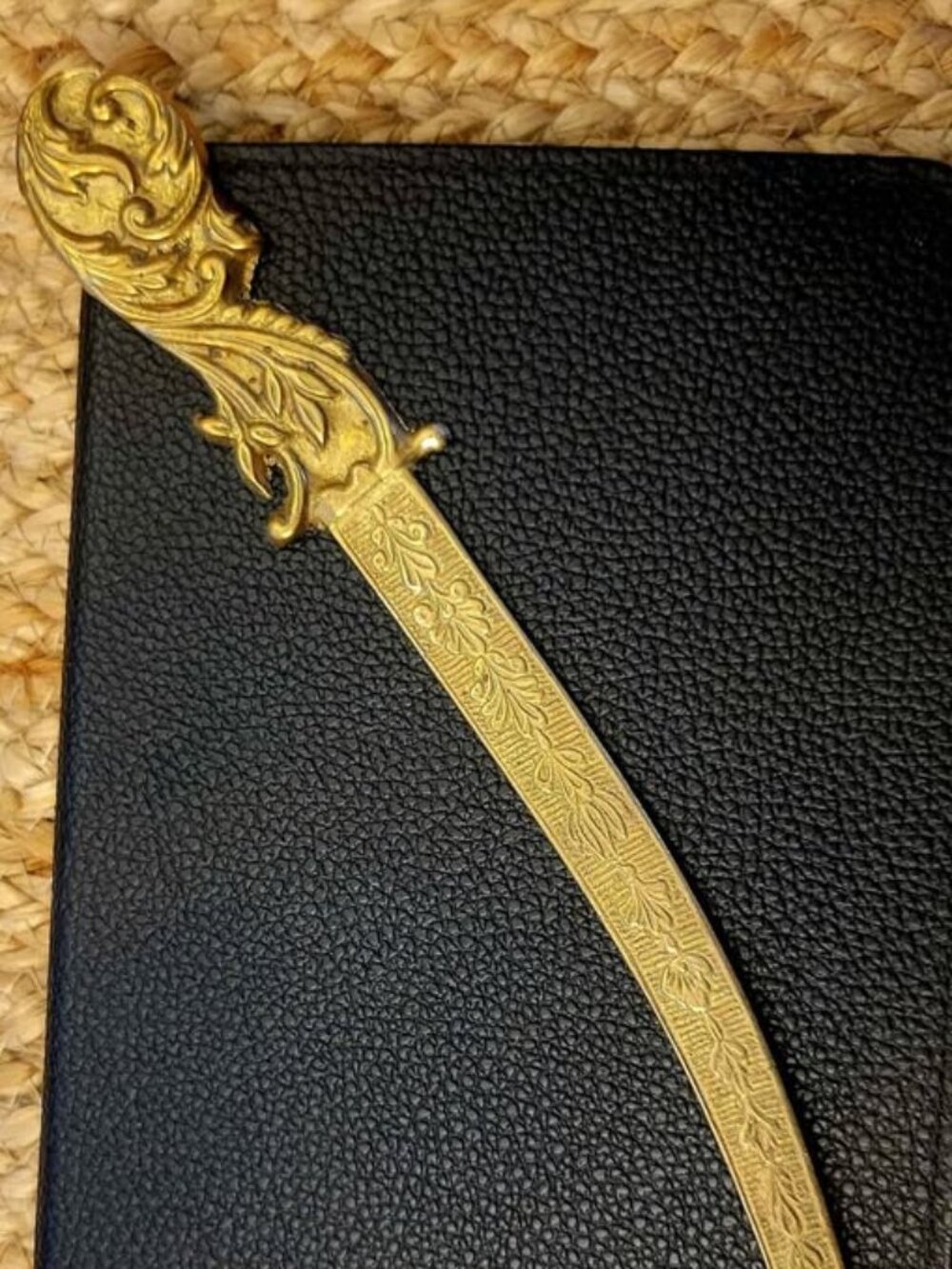 Brass Detailed Letter Opener With An Ornate, Floral Design